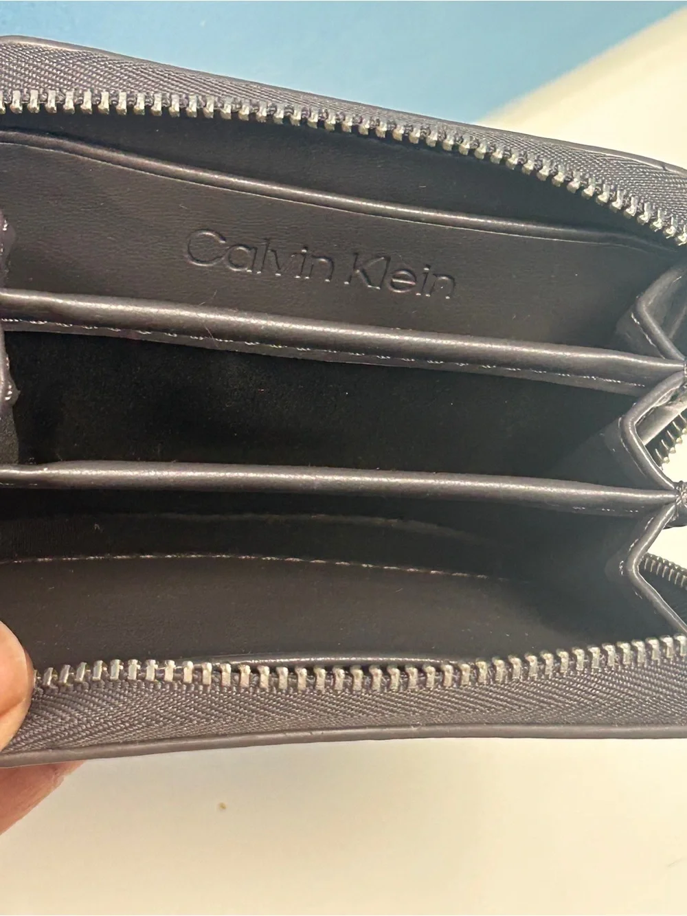 Calvin Klein gray pebbled leather zip wallet